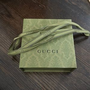 Gucci box and ribbon